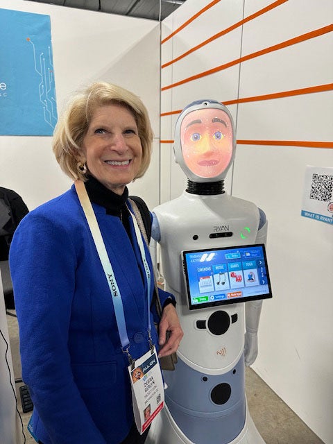 Debbie Berlyn with robot