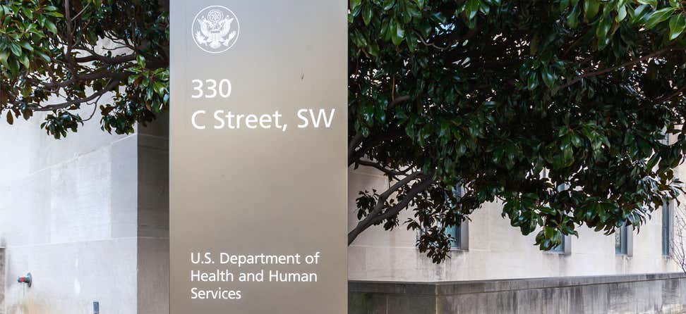 Closeup shot of the U.S. Department of Health & Human Services (HHS) sign at its headquarters building in Washington,.