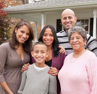 Hispanic-family-in-front-of-home_RT_Modal-PopUp_2020-12_342x331.jpg