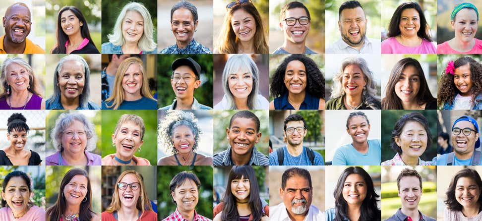 A diverse collection of human portraits, all smiling.