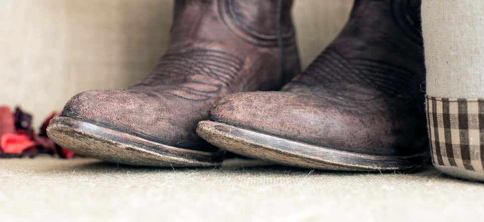 An upclose shot of the toe box of a pair of brown cowboy boots.