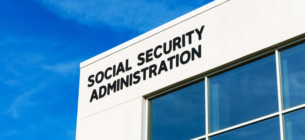 A closeup shot of a Social Security Administration sign on field office building.
