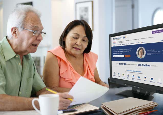 A senior couple is working together to figure out what Medicare benefits they are eligible for via BenefitsCheckup.org.